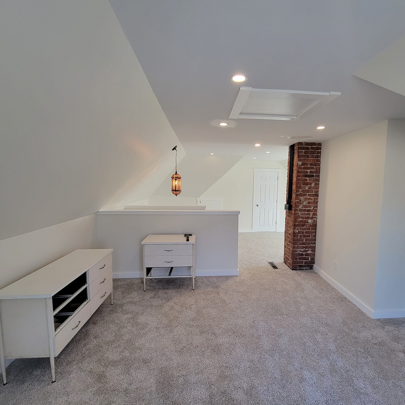 Attic Remodel with Brick Chimney